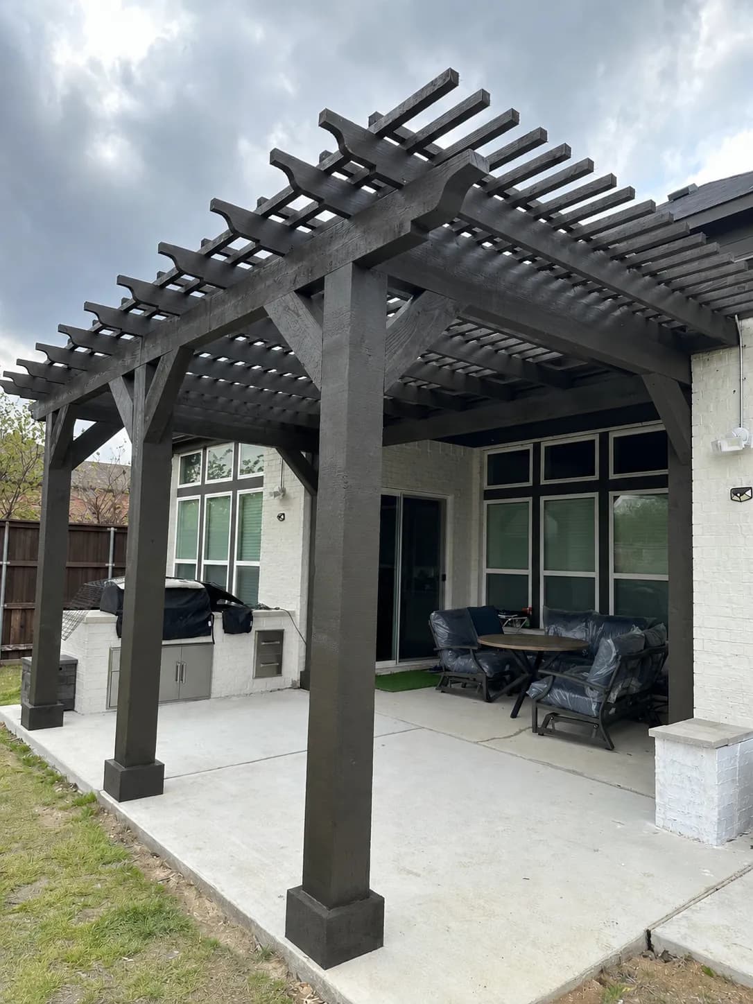 Covered Cedar Pergola over an Outdoor Kitchen — pergolas in Allen, Texas