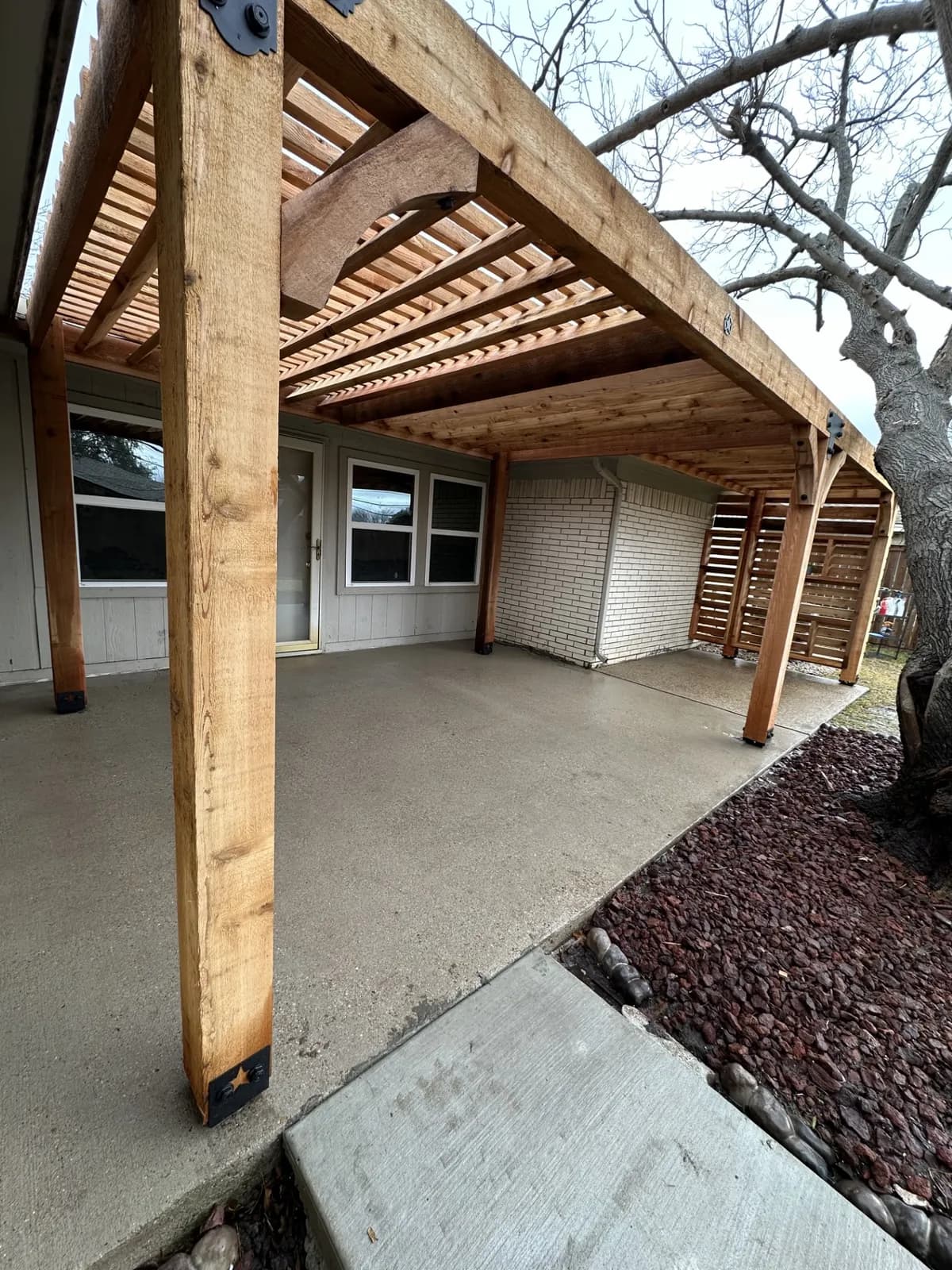 Cedar Pergola with Privacy Slat Wall — pergolas in University Park, Texas